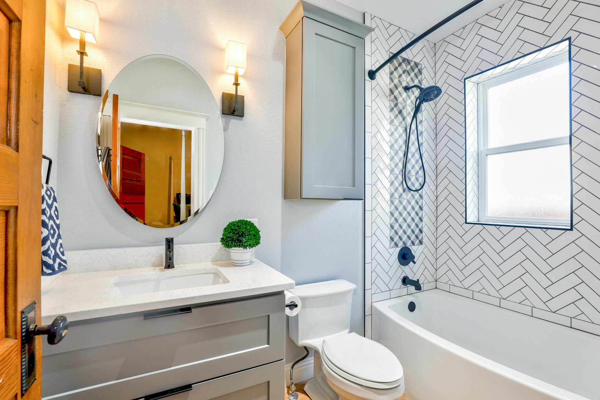 Luxury master bathroom with freestanding tub and marble finishes