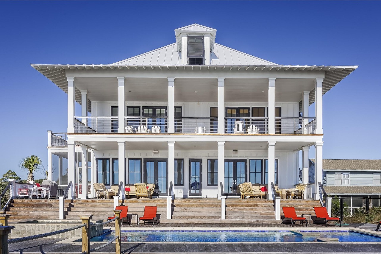 Grand estate home with brick facade and manicured grounds